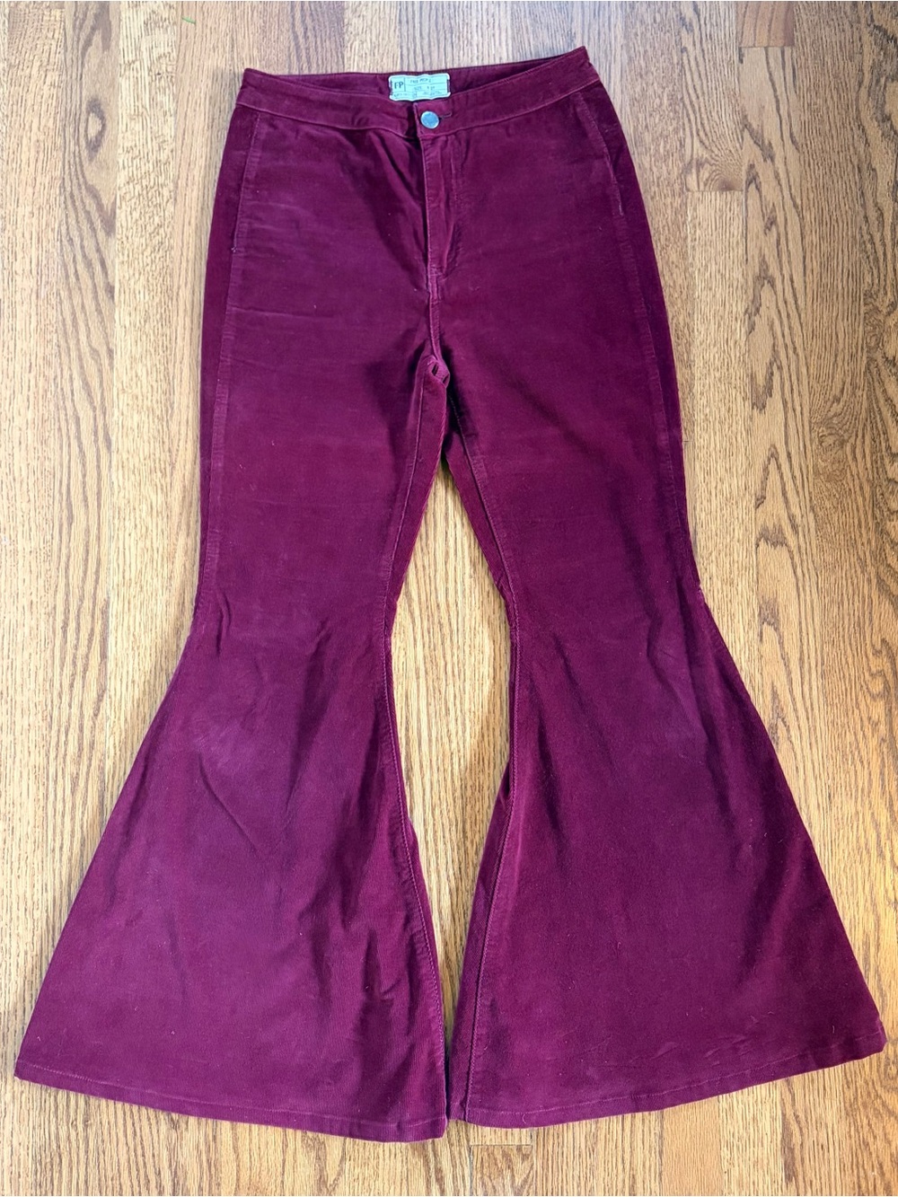 Free People Women’s Flared Corduroy Pants in Burgundy